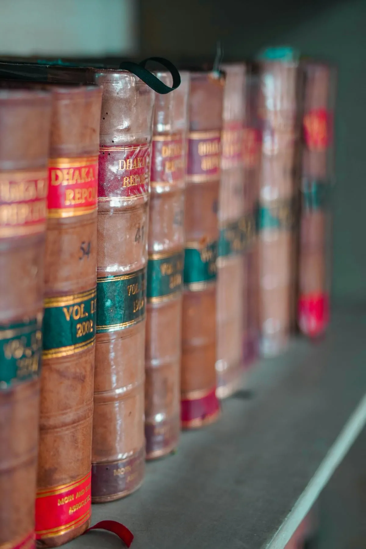 Rows of bound legal volumes on a library shelf
